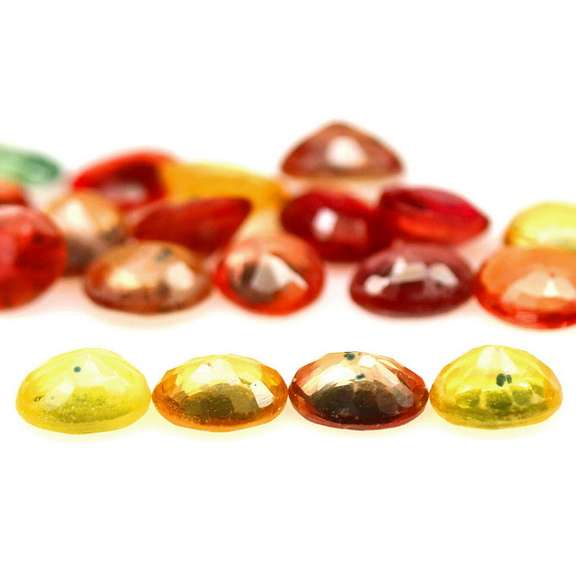 Heated only! Vibrant 7.81ct fancy color Sapphire set