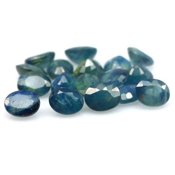 Heated only! 8.82ct blue green Sapphire set