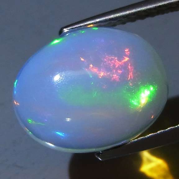 Glowing! 3.07ct rolling floral pattern Jelly Opal