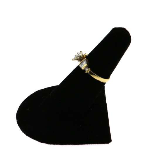 Regal 14k Gold Diamond Ring flanked by Baguette Diamonds