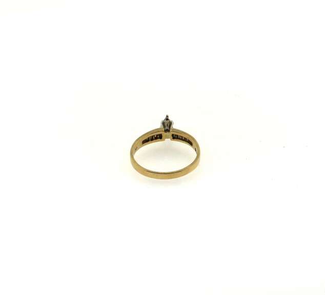 Classic Solitaire 14k Gold Diamond Ring with channel set Baguette Diamond