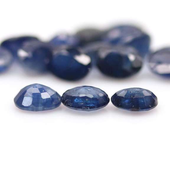 Stunning ink blue 7.22ct oval Sapphire set