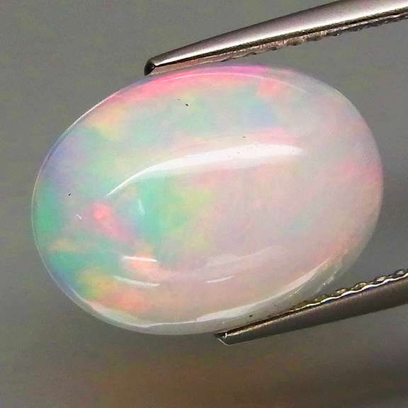 Vibrant 3.75ct rolling floral flashing Welo Opal