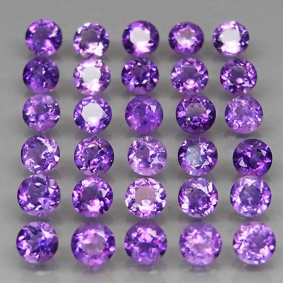 Glittering 7.59ct round cut Bolivian Amethyst set