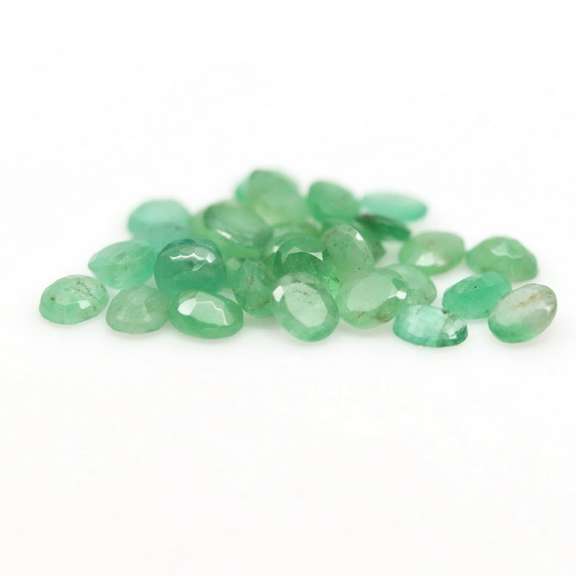 Oval cut 8.97ct Zambian Emerald set