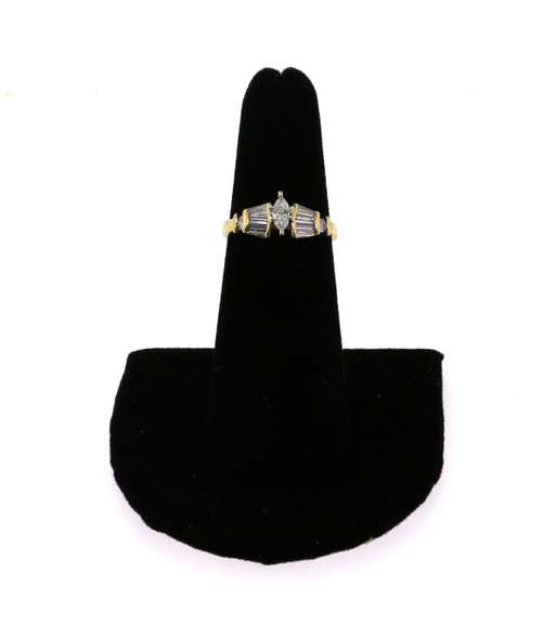 Regal 14k Gold Diamond Ring flanked by Baguette Diamonds