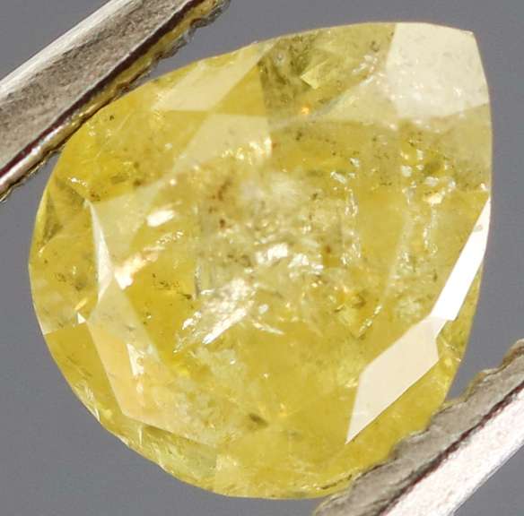 Bright .59ct lemon drop yellow unheated Diamond