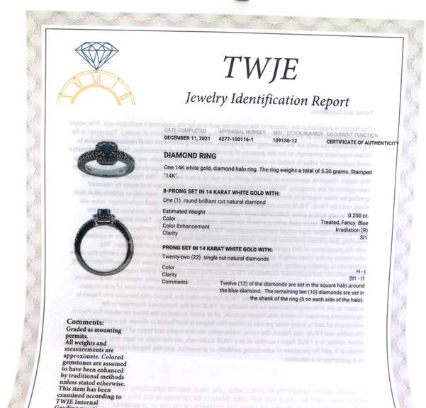 Gorgeous White Gold Blue Diamond Halo Ring