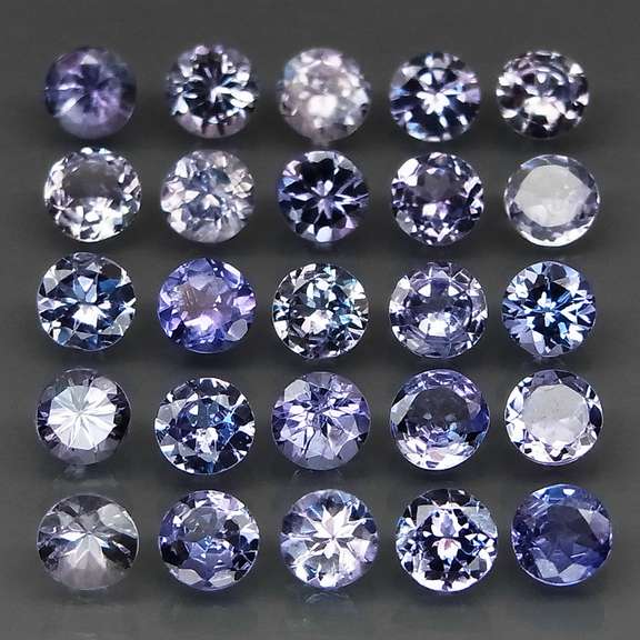 Glittering 5.34ct bright blue violet Tanzanite set