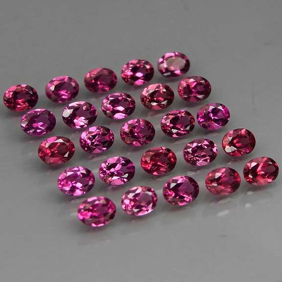Lavish 5.62ct violet pink pure Rhodolite Garnet set