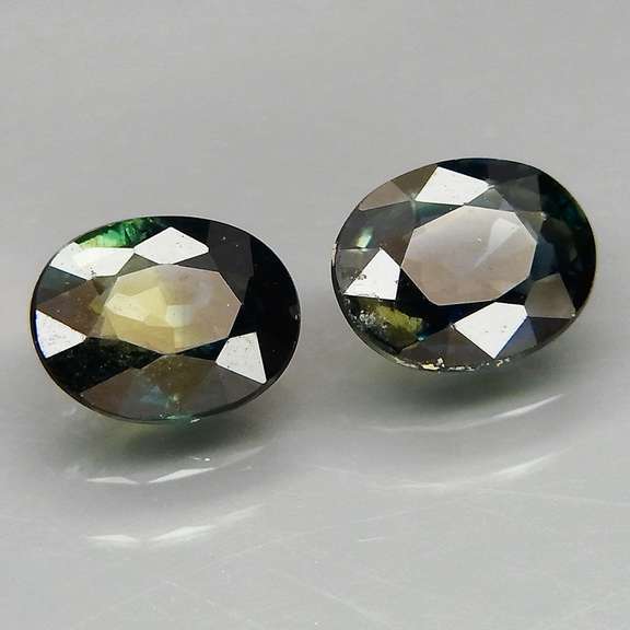 Excellent 1.49ct matched pair of blue green Sapphires