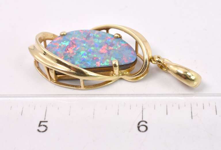 Luxurious Opal Pendant in 14K Yellow Gold