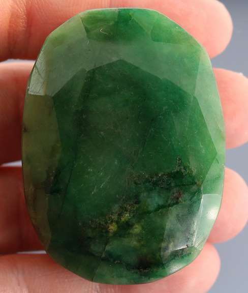 Heavy 329ct oval cut forest green Emerald