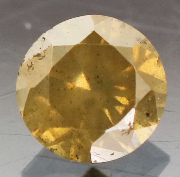 Eye catching 0.41ct golden orange Diamond solitaire