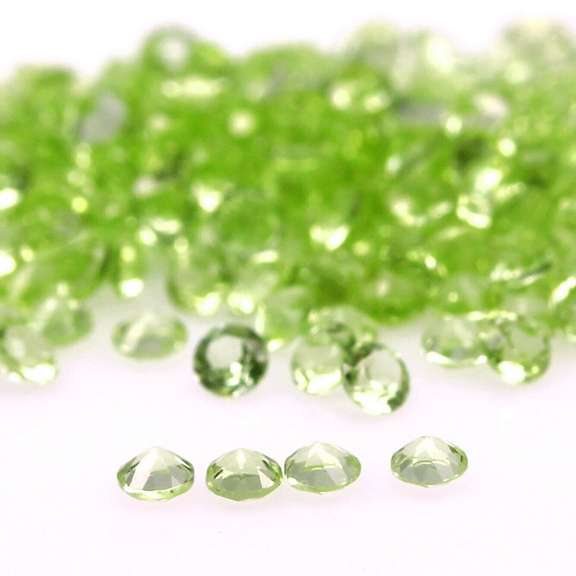 Diamond cut! Unheated! 5.21ct Peridot set
