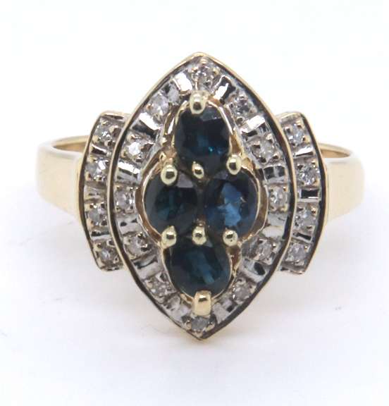 Charming Yellow Gold Marquise Shaped Blue Sapphire and Diamond Ring