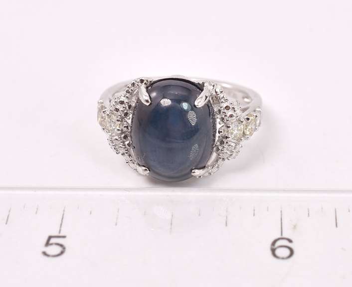 Stunning 8.83CTS Star Sapphire and 0.40CTW Diamond Sterling Silver Ring