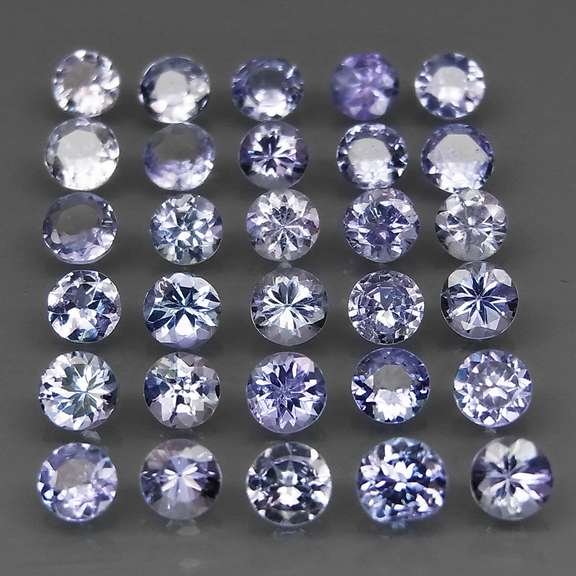 Glittering 5.61ct bright blue violet Tanzanite set