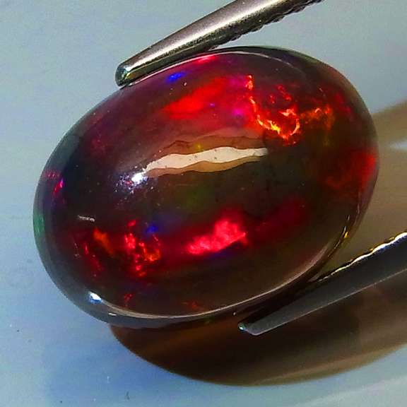 Full body flashing 3.67ct Welo Black Opal