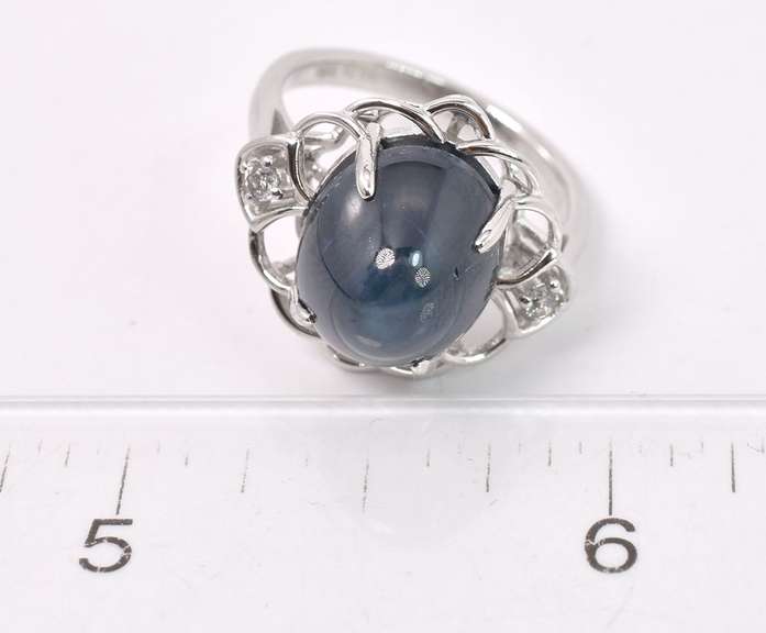 Wonderful 11.11CTS Star Sapphire and 0.08CTW Diamond Ring in Sterling Silver