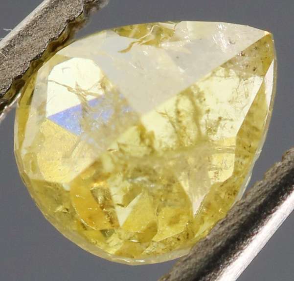 Bright .59ct lemon drop yellow unheated Diamond
