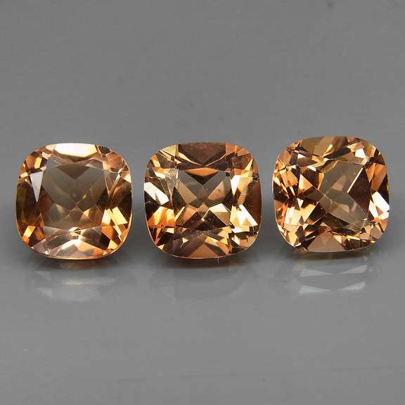 Matched! 3 piece 11.43ct full fire Imperial Topaz set