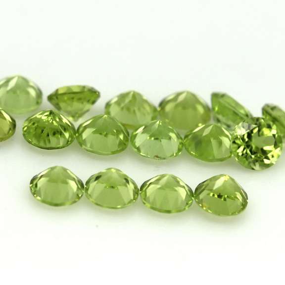 Dazzling 4.97ct untreated apple green Peridot set