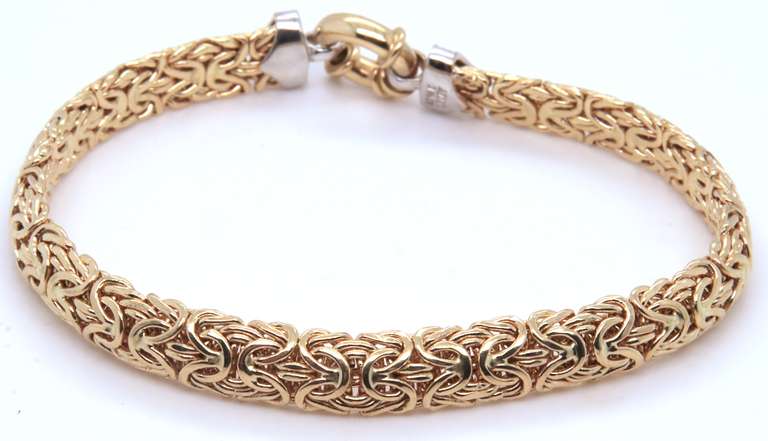 Dynamic Yellow Gold Byzantine Bracelet with Diamond accents