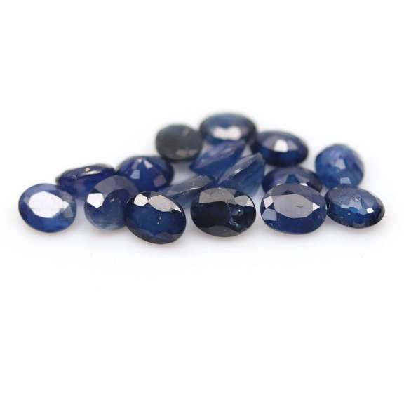 Stunning ink blue 7.22ct oval Sapphire set