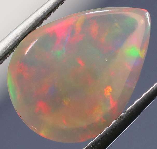Vivid flashing unheated 2.92ct Jelly Opal