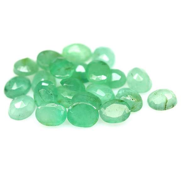 Oval cut 7.05ct Zambian Emerald set