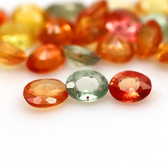 Heated only! 6.60ct fancy color Sapphire set