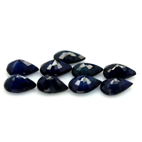 Stunning ink blue 7.34ct pear Sapphire set