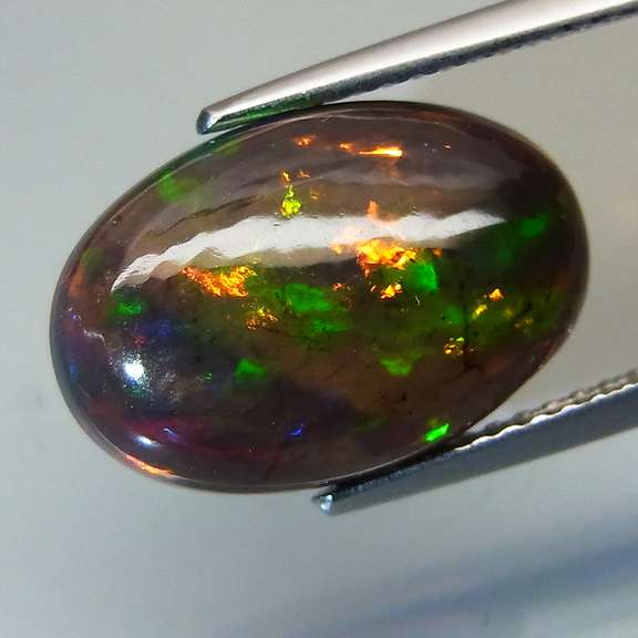 Magnificent 3.72ct disco flashing Black Opal