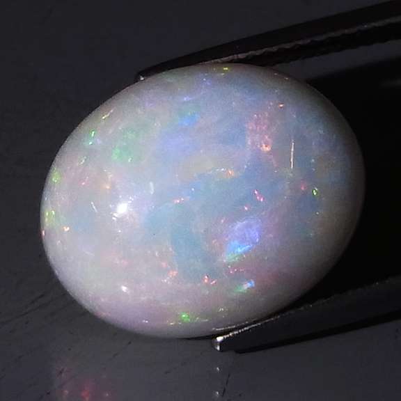 Huge 14.31ct full body flashing Welo Opal