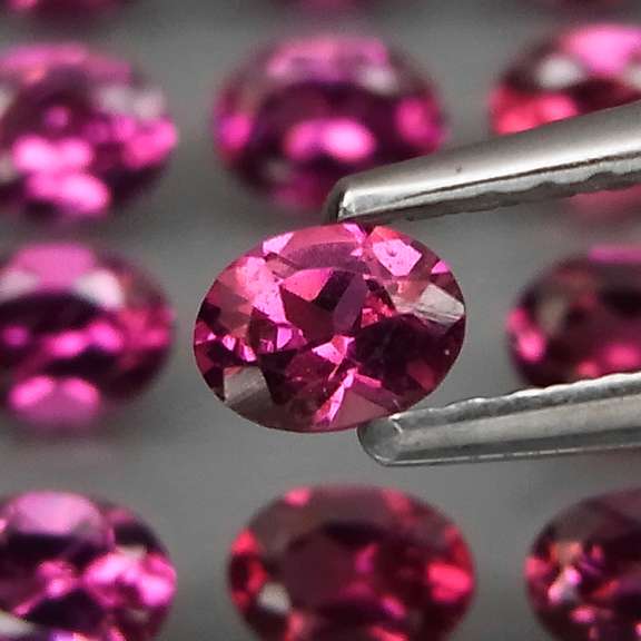 Lavish 5.62ct violet pink pure Rhodolite Garnet set