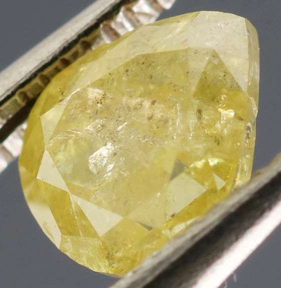 Bright .59ct lemon drop yellow unheated Diamond