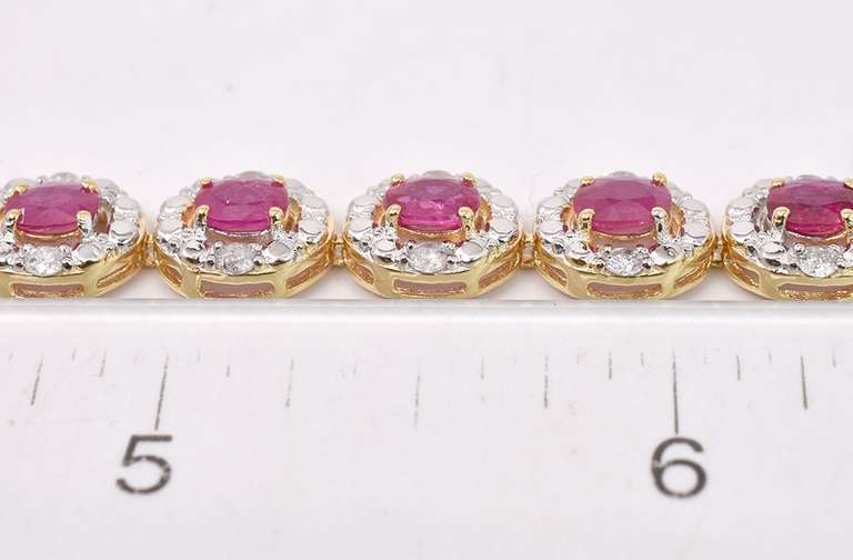 Elegant 7.99CTW Ruby and 1.42CTW Diamond Braceled in Gold Plated Sterling Silver