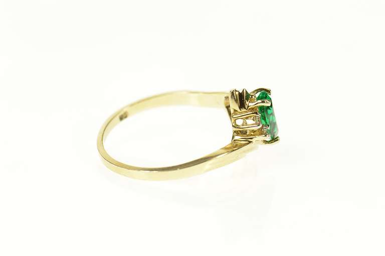 10K Yellow Gold Marquise Sim. Emerald Diamond Accent Ring