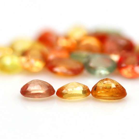 Heated only! 6.60ct fancy color Sapphire set