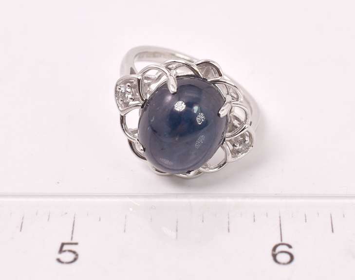 Sensational 11.11CTS Cabochon-Cut Star Sapphire & 0.08CTW Diamond Ring in Sterling Silver