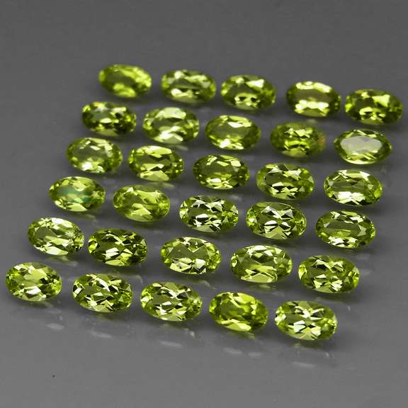 Dazzling 7.47ct untreated lime green Peridot set