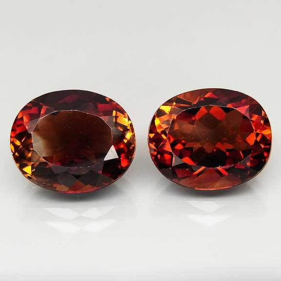 Coffee red! 12.28ct Imperial Topaz set