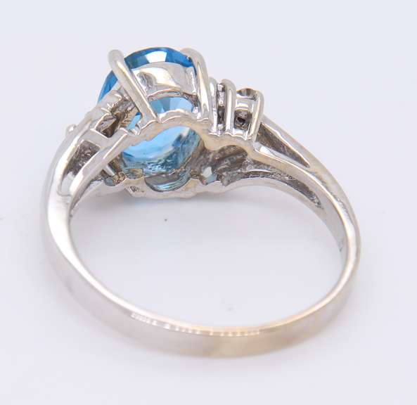 Handsome White Gold Oval Blue Topaz and Diamond Ring