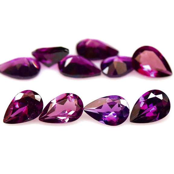 Amazing 4.79ct pear cut violet pink Rodolite Garnet set