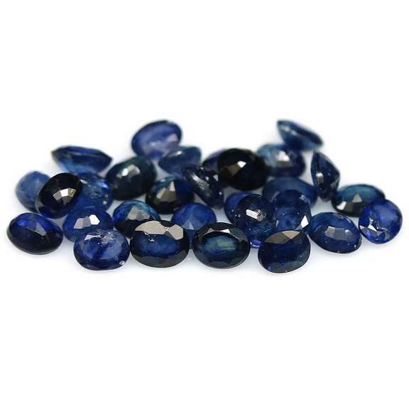 Stunning ink blue 8.64ct oval Sapphire set