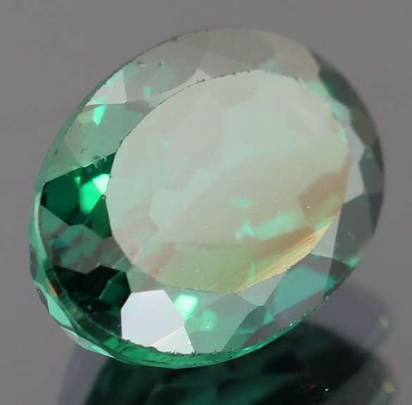 Attention grabbing 8.69ct emerald green Mystic Topaz