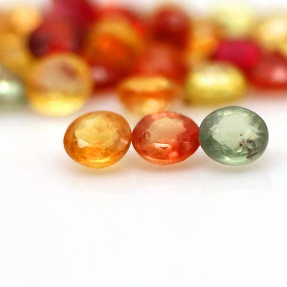 7.03ct heated only Autumn leaves Sapphire set