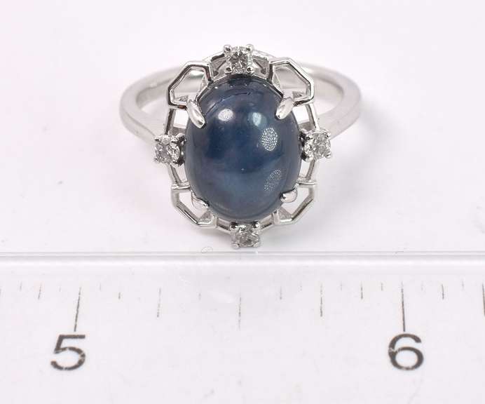 Darling 7.01CTS Cabochon-Cut Star Sapphire and 0.17CTW Diamond Ring in Sterling Silver