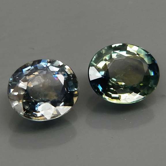 Heated only 1.37ct blue green glittering Sapphire set